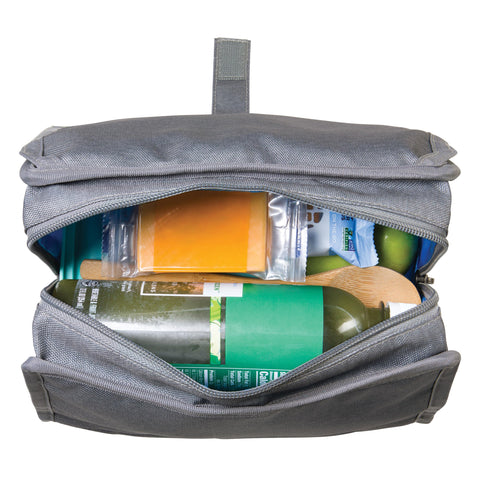 PackIt frozen flat in a freezer demonstrating built-in gel cooling for hours of chill