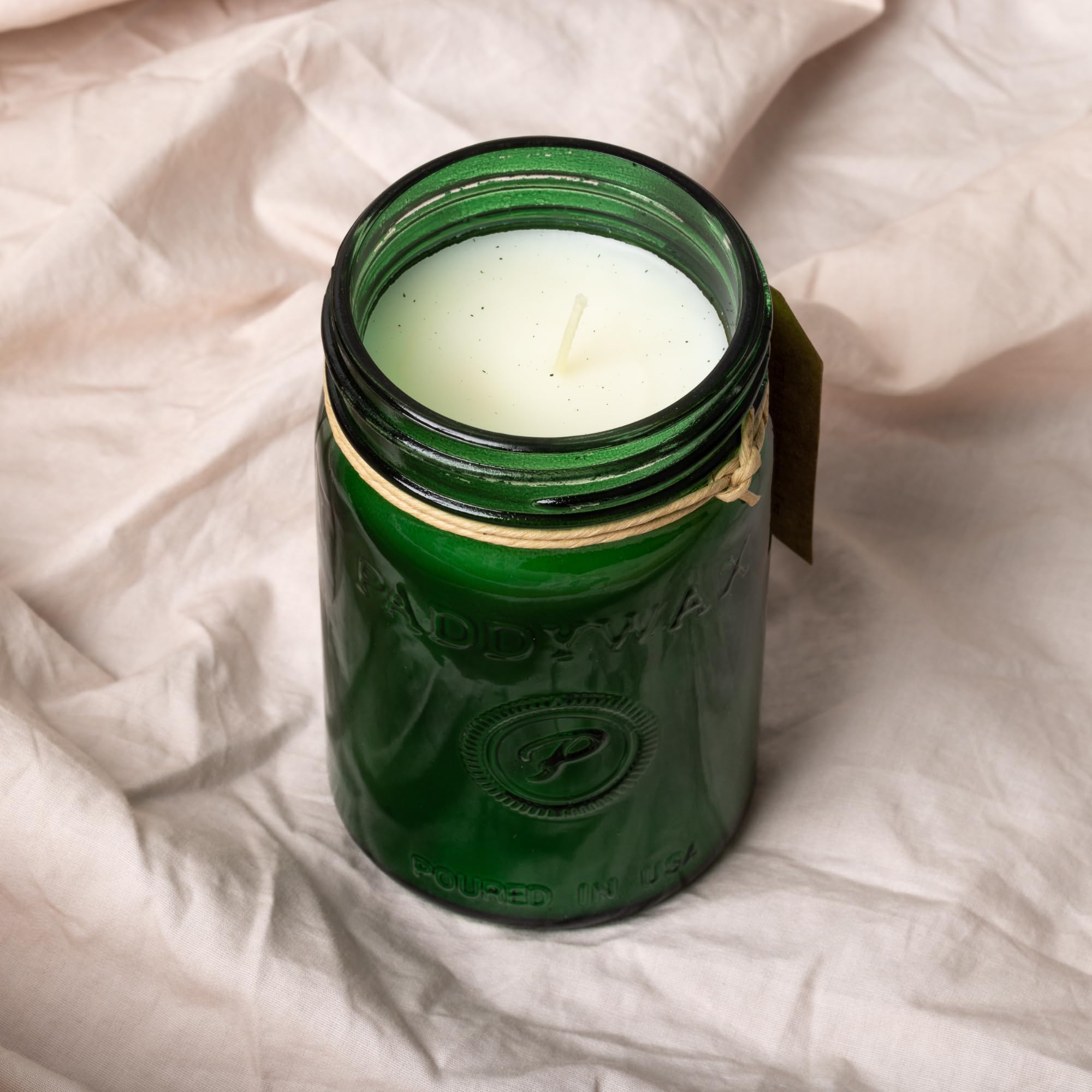 Paddywax close-up of wax and cotton wick, highlights clean burn benefit