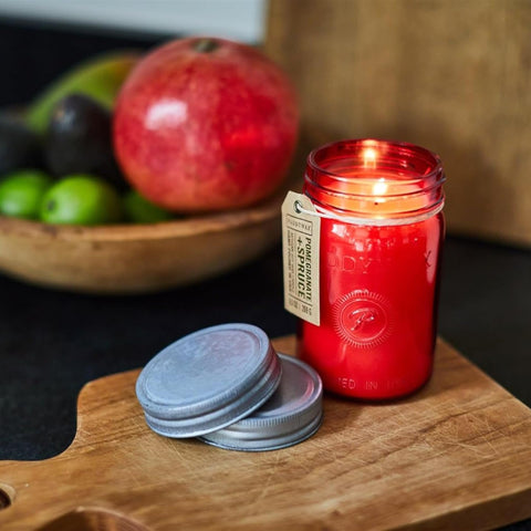 Paddywax Relish fragrance ingredients with pomegranate and spruce, illustrating scent profile