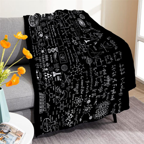 Padumuttara front view of blanket on couch showing full chalkboard print and cozy appeal