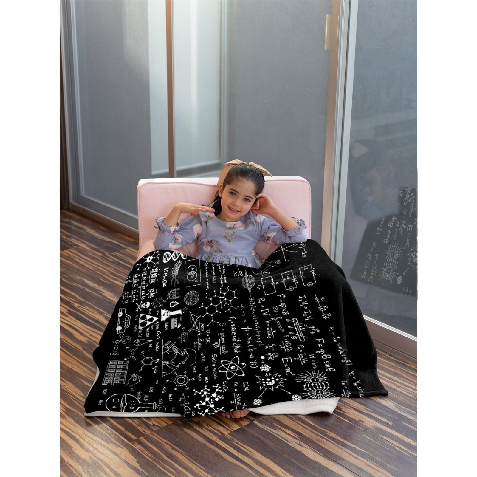 Padumuttara blanket draped on sofa in living room demonstrating stylish room upgrade