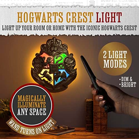 Paladone Hogwarts crest on nightstand showing cozy bedside lighting