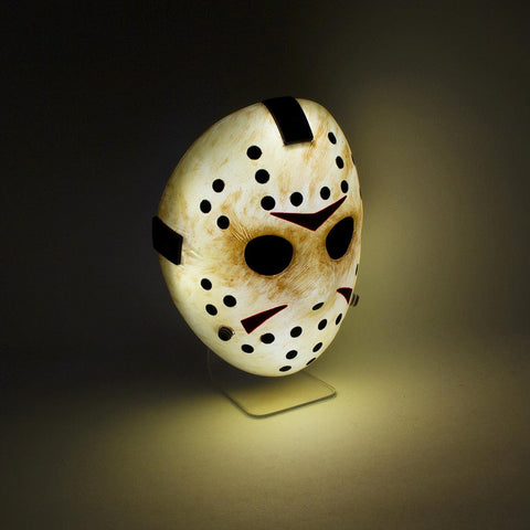 Paladone Jason mask lit on a nightstand offering spooky ambient light