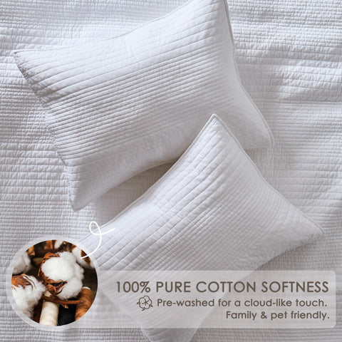 palassio quilt styled on bed in farmhouse room, creates cozy welcoming atmosphere