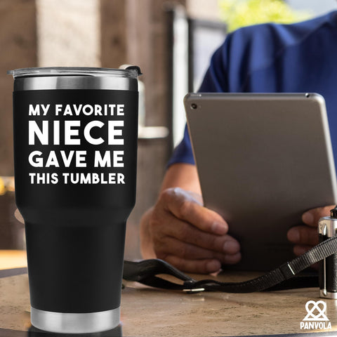 Panvola tumbler on gift-wrapped table for family occasion and laugh factor