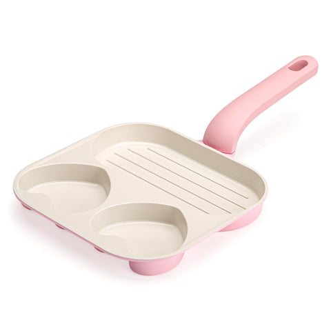 Paris Hilton front view of pink divided skillet showing hearts and grill for fun cooking