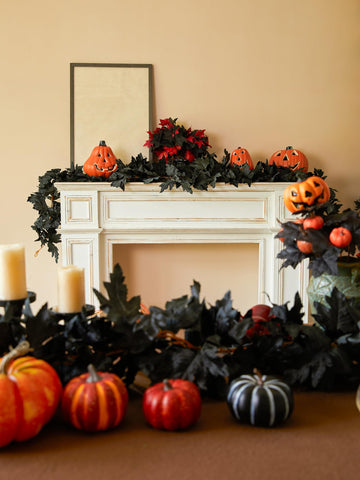 PARTY JOY garland draped on mantel creating gothic seasonal ambience