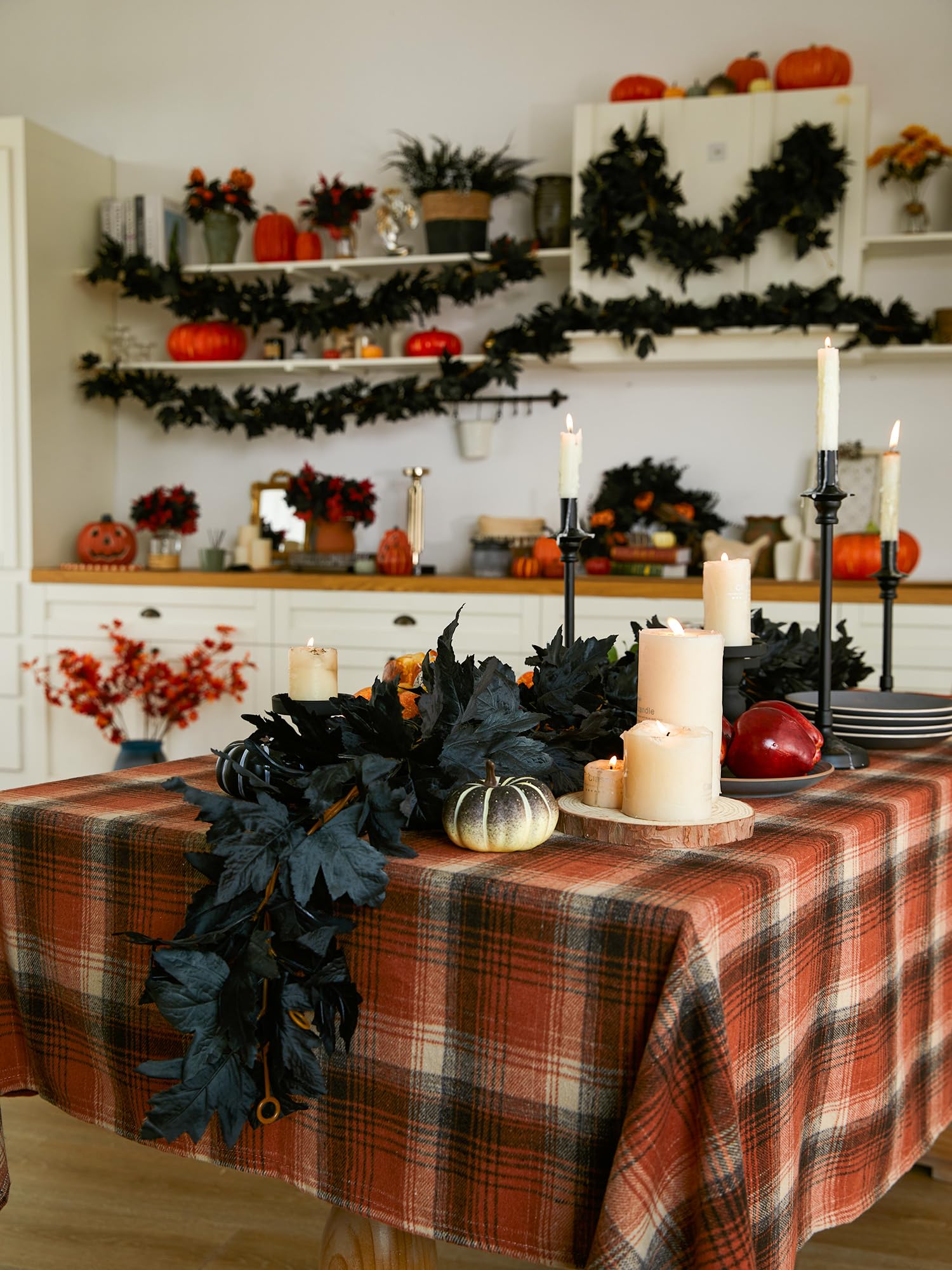 PARTY JOY porch decorated for Halloween with dark maple garlands for curb appeal