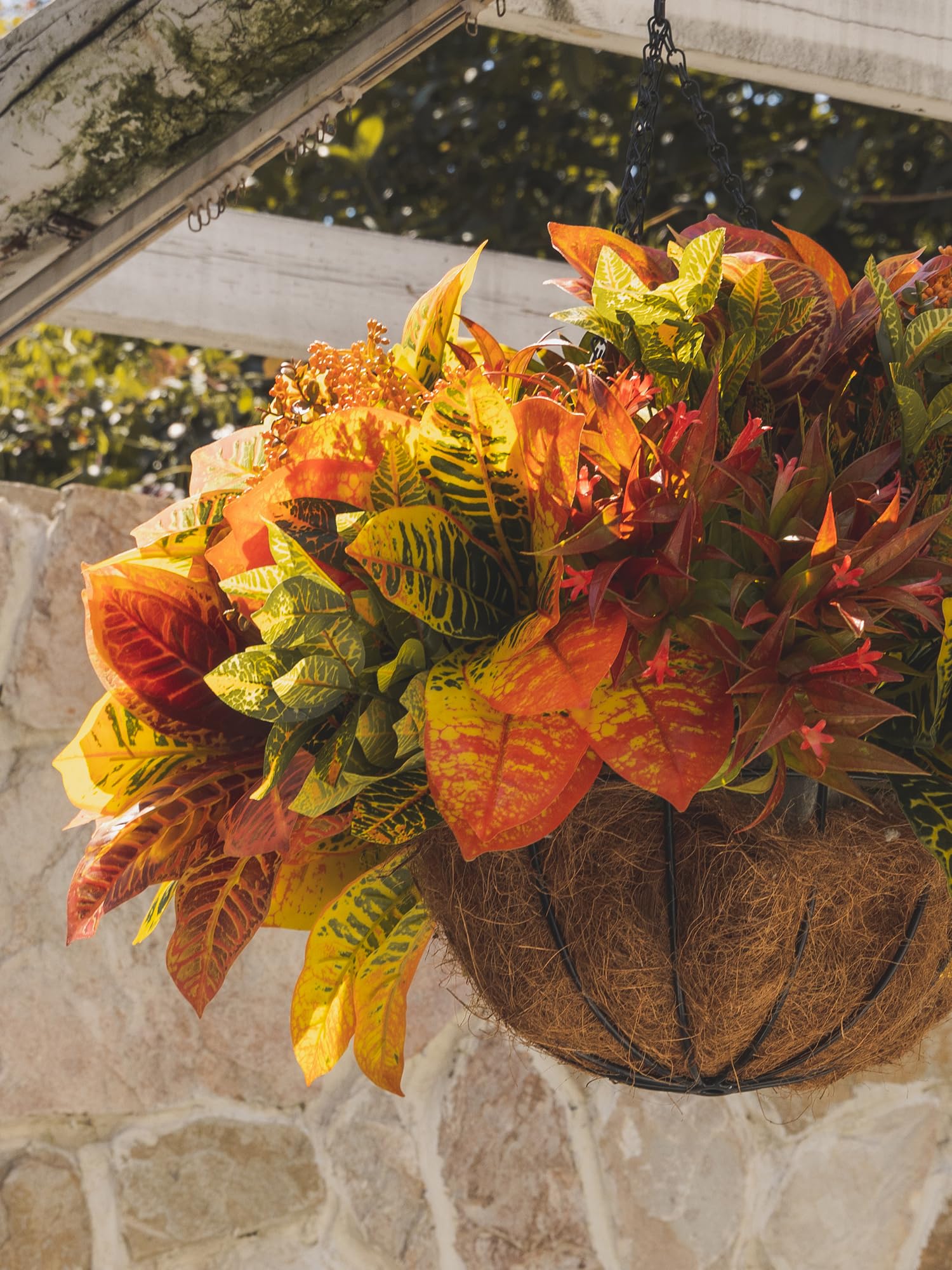PARTY JOY arranged stems in patio planter adding maintenance-free seasonal color