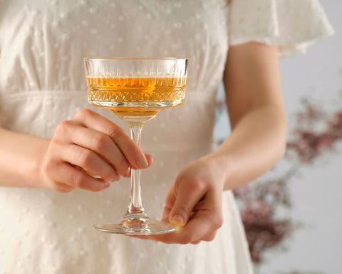 Pasabahce coupe filled with champagne demonstrating presentation and fizz enjoyment