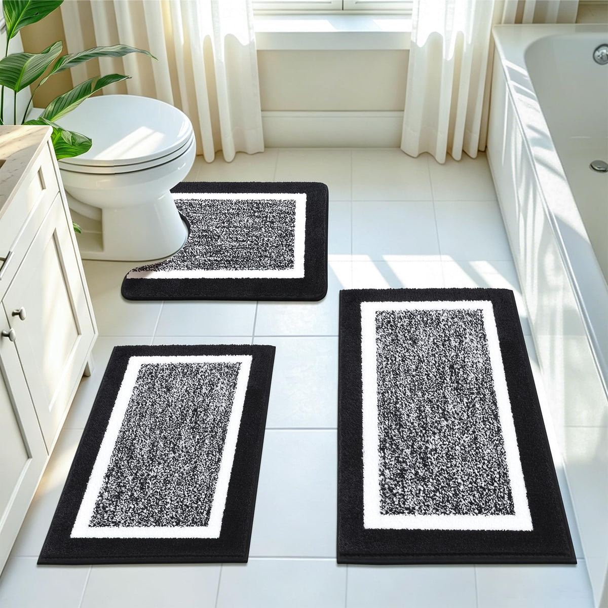 Pauwer front view of black 3-piece rug set showing plush mats and coordinated look