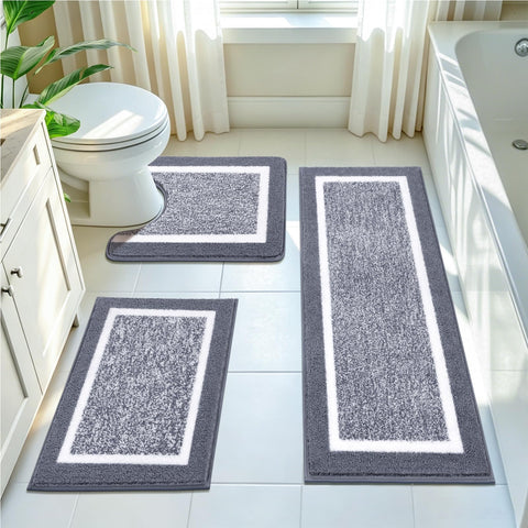 Pauwer front view of dark grey rug set shows coordinated style and softness