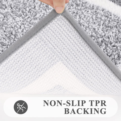 Pauwer view of TPR non-slip backing showing grip for safety on smooth bathroom floors