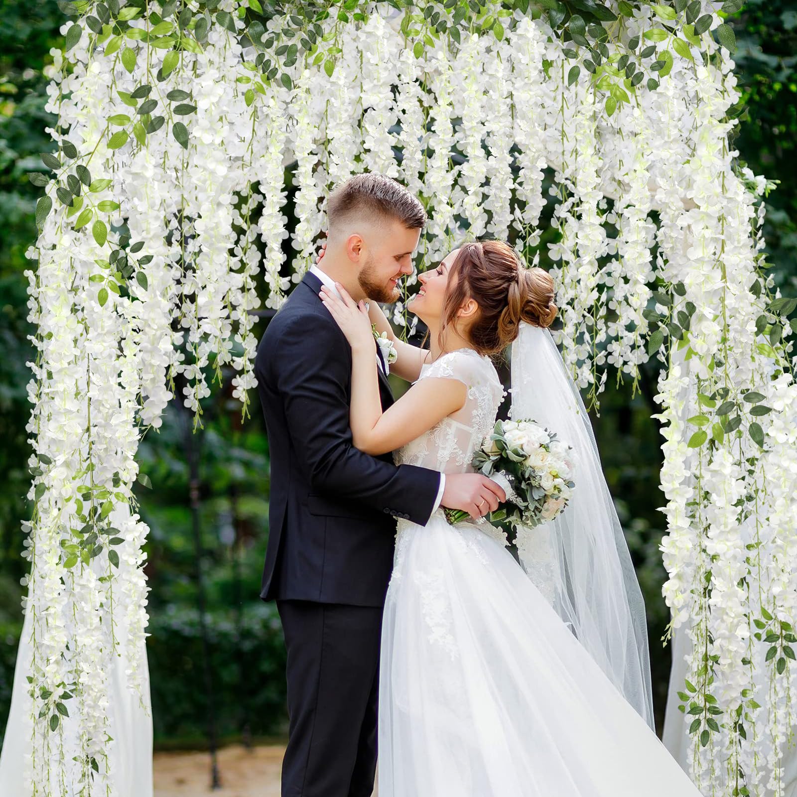 Pauwer wisteria hung on a wedding arch creating an elegant ceremony backdrop