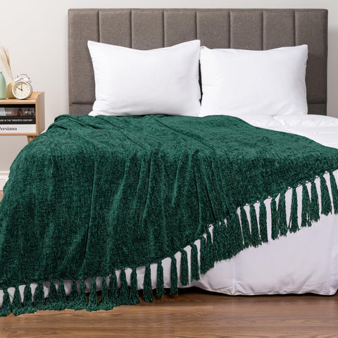 PAVILIA blanket draped over sofa adding color and cozy atmosphere