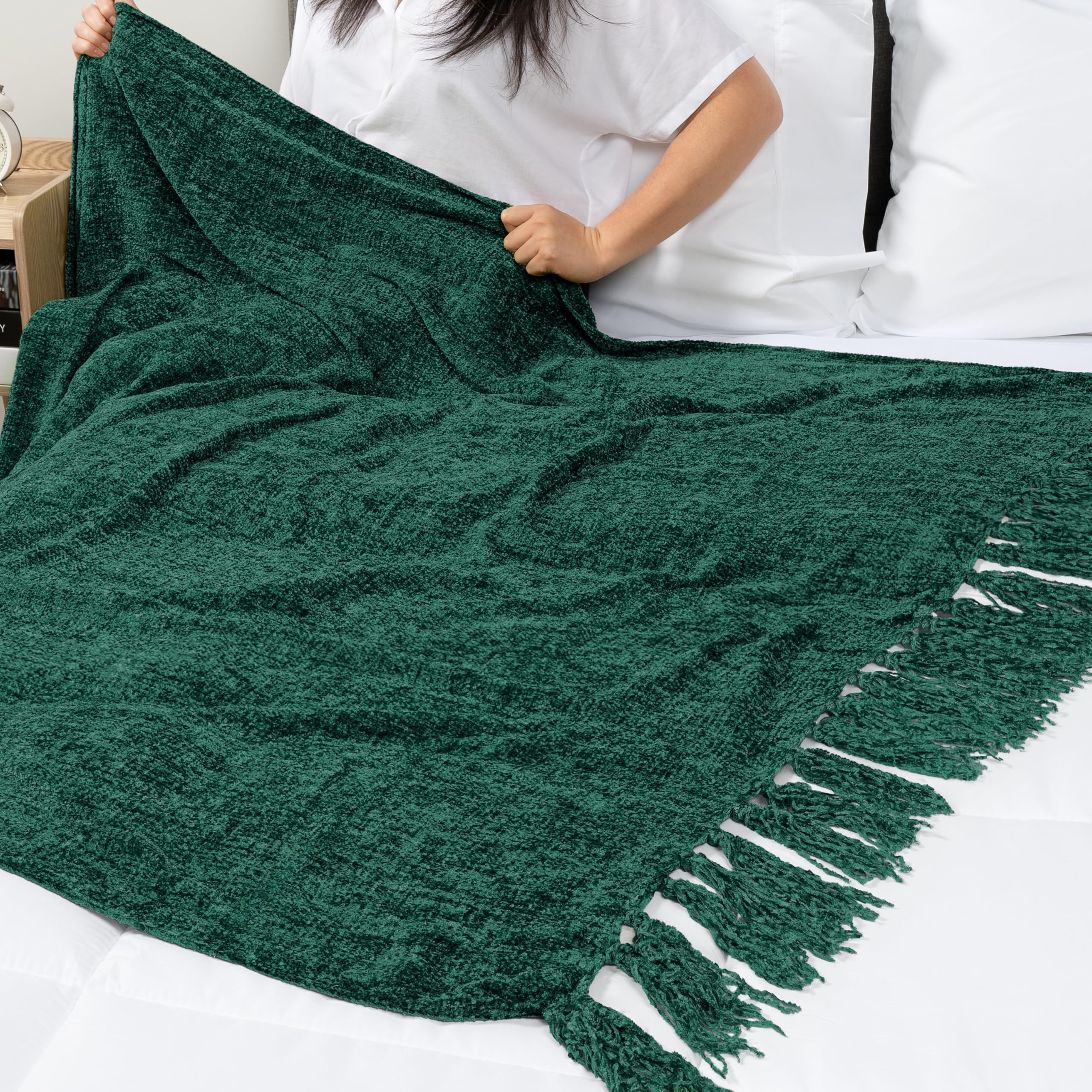 PAVILIA blanket rolled in basket portraying easy storage and decor benefit