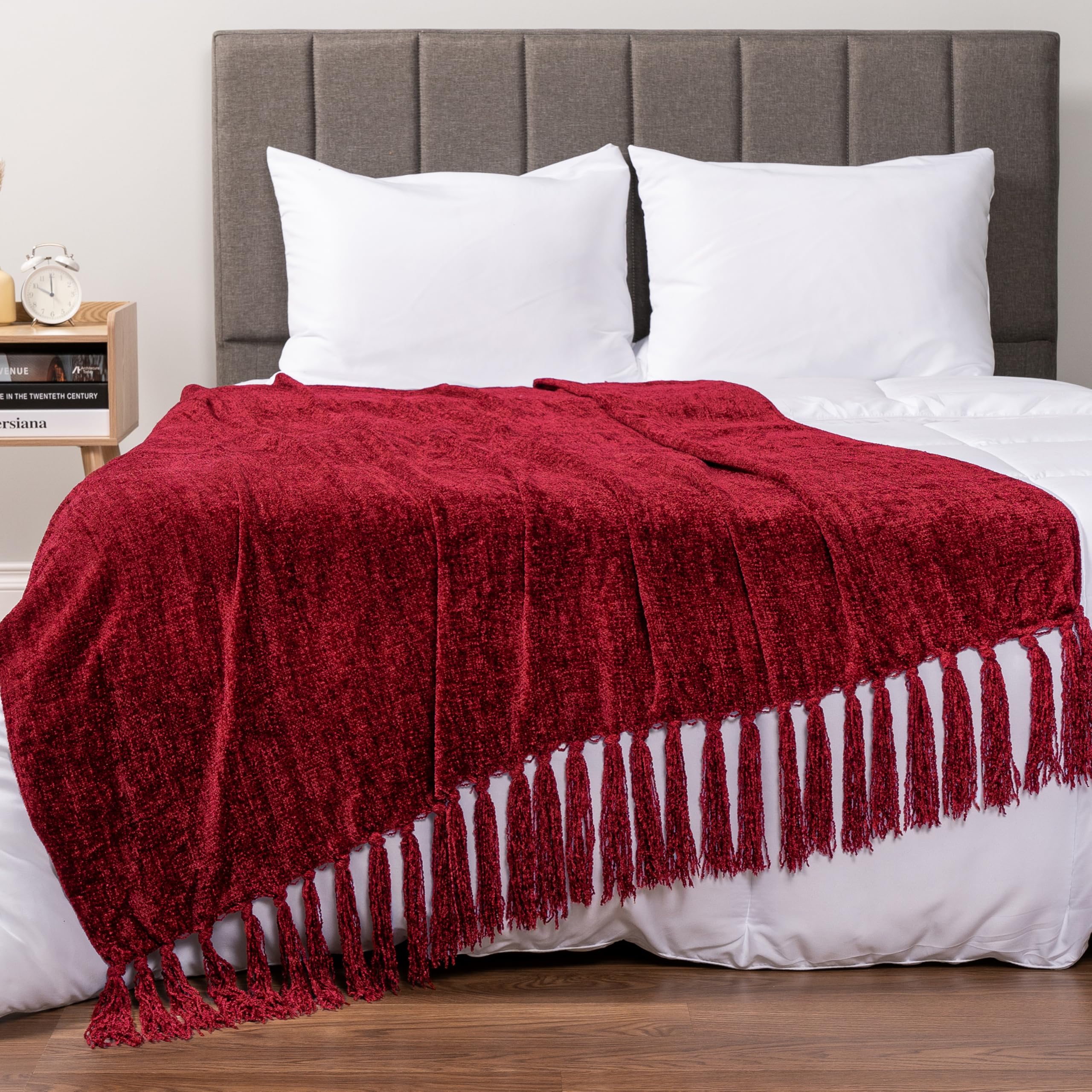 PAVILIA throw draped over sofa showing how it accents living room decor