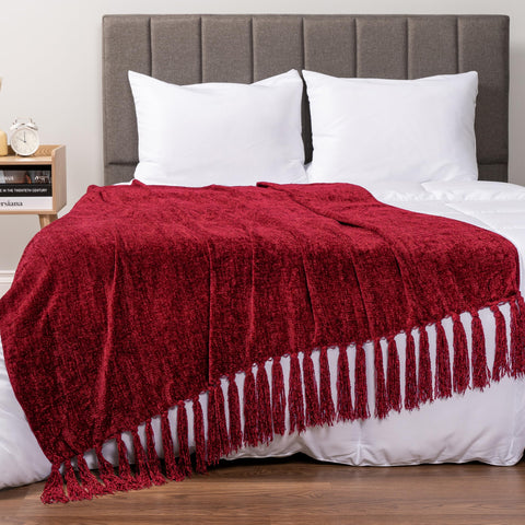PAVILIA throw draped over sofa showing how it accents living room decor