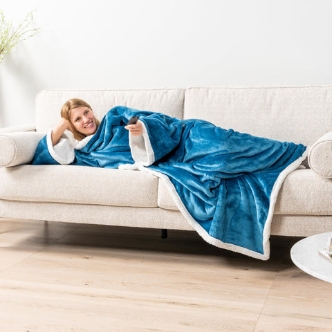 PAVILIA full-length seated model wearing blanket for cozy lounging