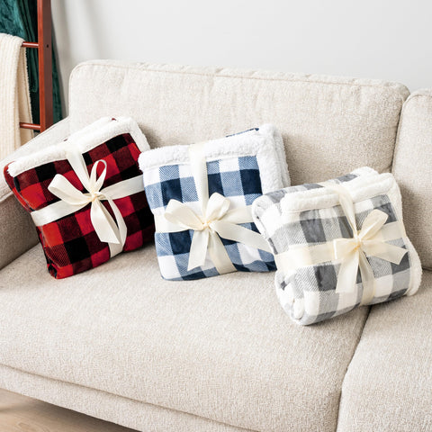 PAVILIA gift wrapped blanket setting suggesting ready-to-give presentation