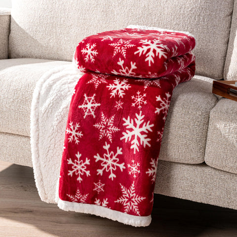 PAVILIA blanket in lifestyle scene by tree conveying inviting warmth