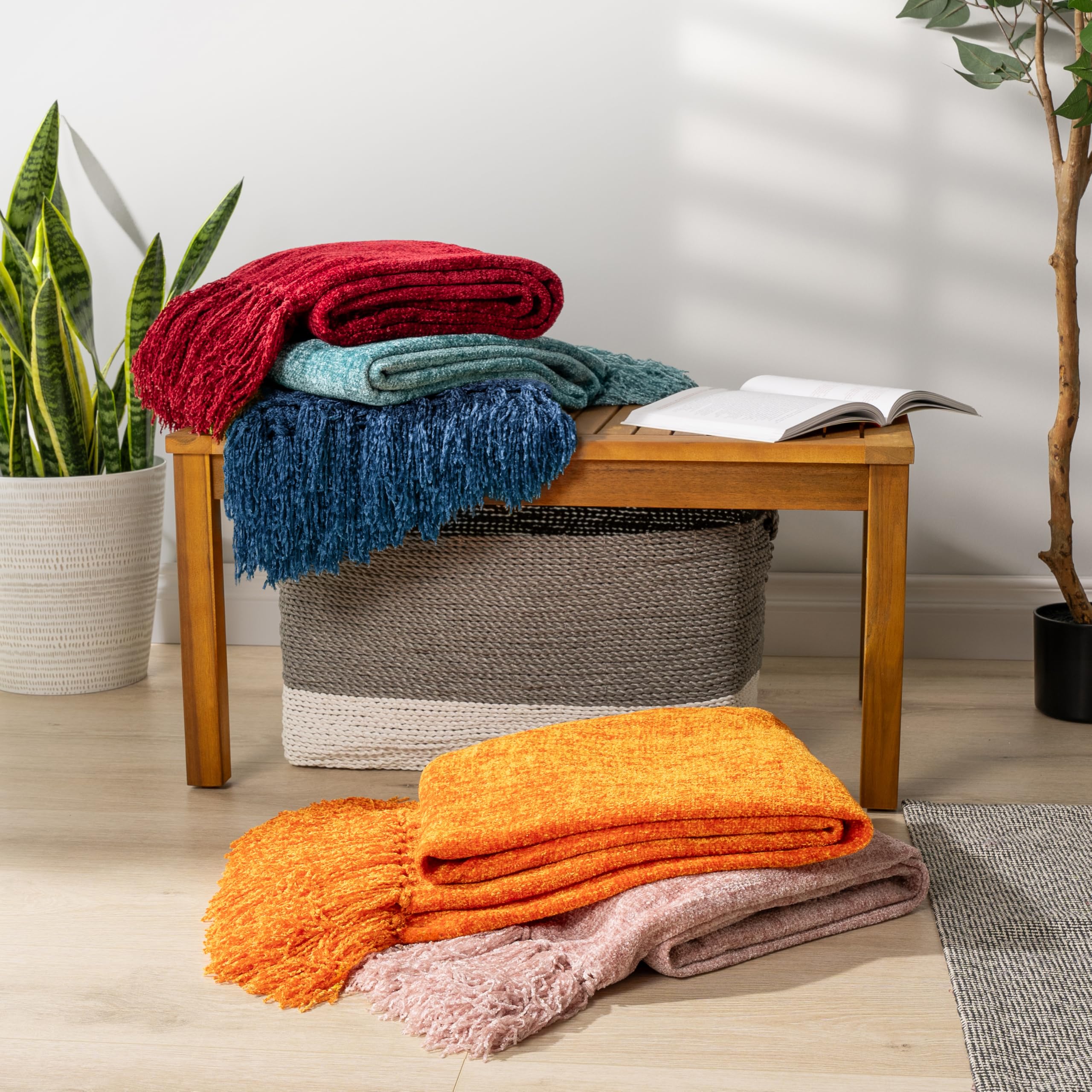 PAVILIA blanket on chair showing 50x60 scale and practical fit