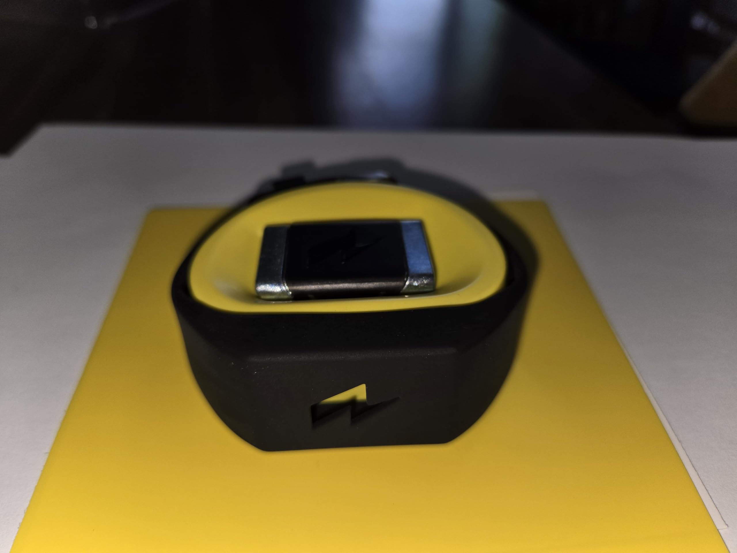 Pavlok side profile displaying low-profile case and comfortable fit benefit