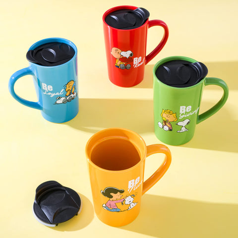 Peanuts Snoopy travel mug on kitchen table adding playful breakfast charm