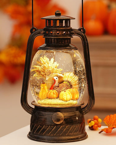 PEATOP front view snow globe showing pumpkin turkey scene and warm glow