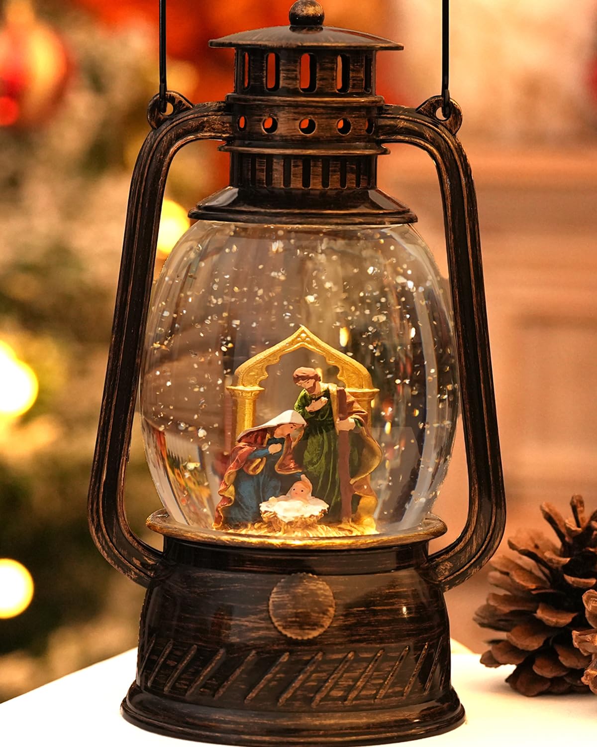 PEATOP nativity snow globe front view showing scene and warm light benefit