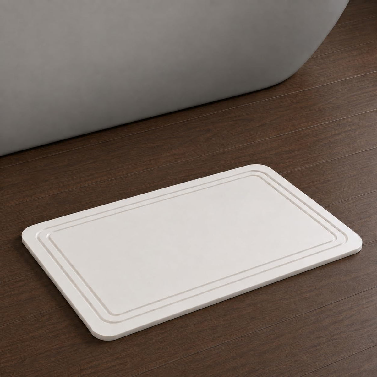 Pebble Nest front packaging shows White Linea mat and quick-dry benefit