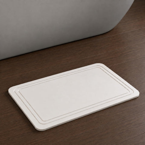 Pebble Nest front packaging shows White Linea mat and quick-dry benefit