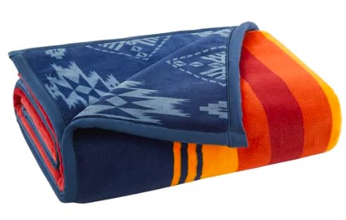 Pendleton throw draped on sofa showing 50x70 size and layered decor versatility