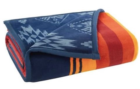 Pendleton throw draped on sofa showing 50x70 size and layered decor versatility