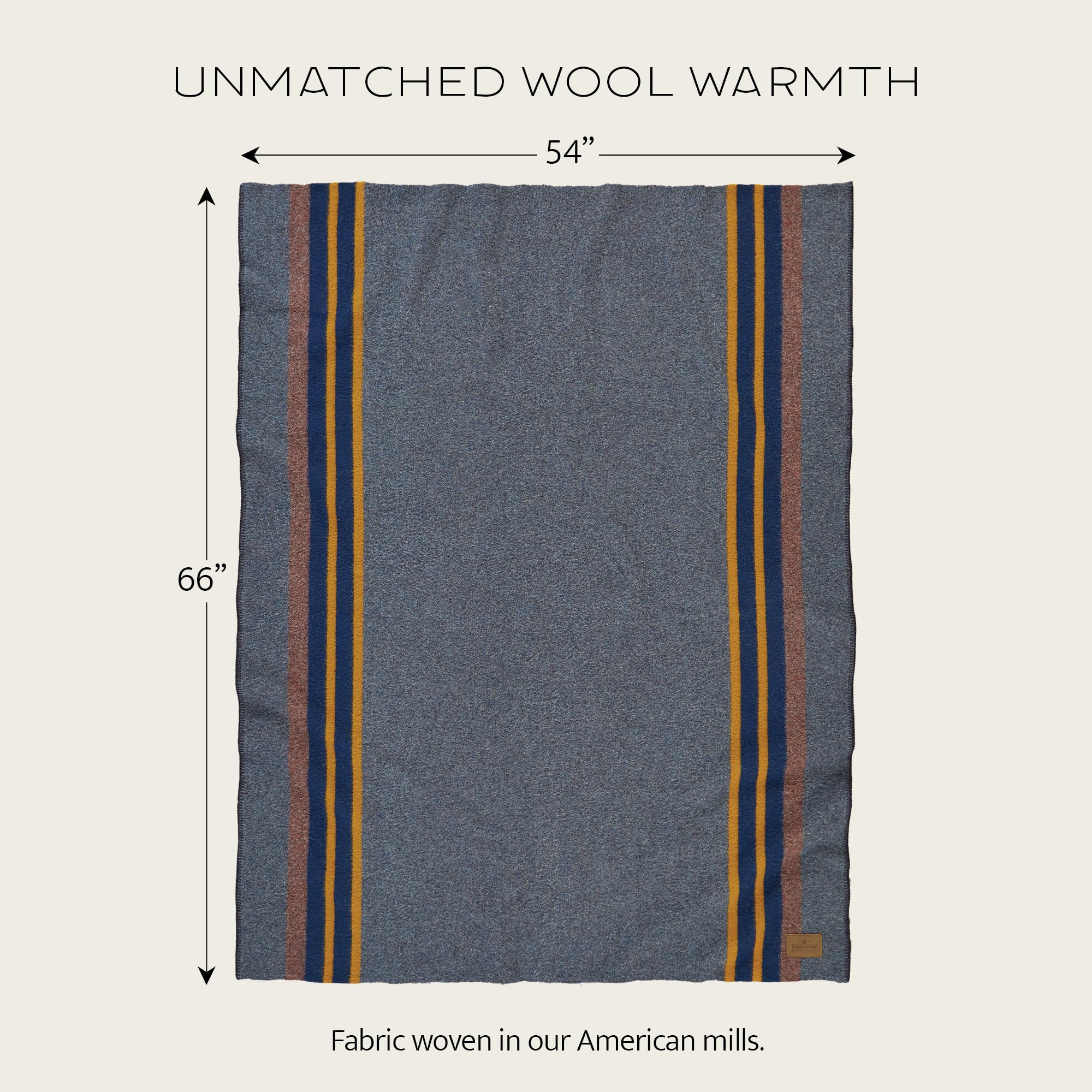 Pendleton throw next to person illustrating generous 54 by 66 size