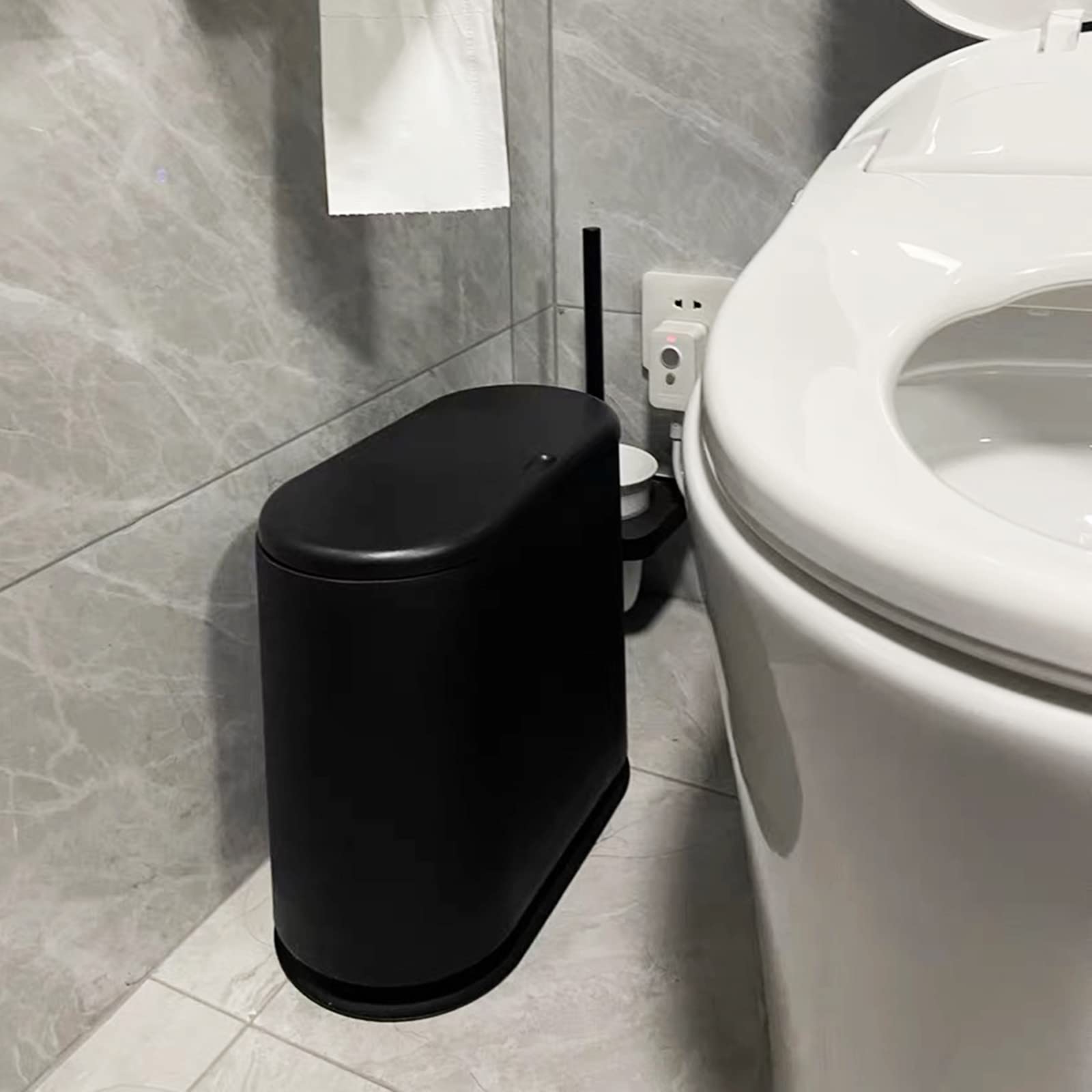 PENGKE placed in bathroom setting highlighting tidy, discreet waste containment