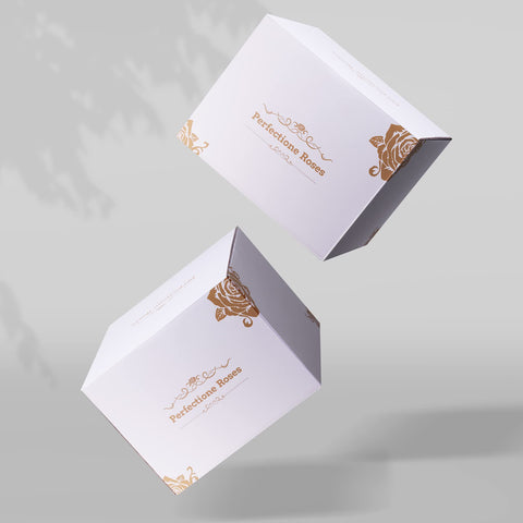 Perfectione Roses box next to hand showing size and scale for gifting