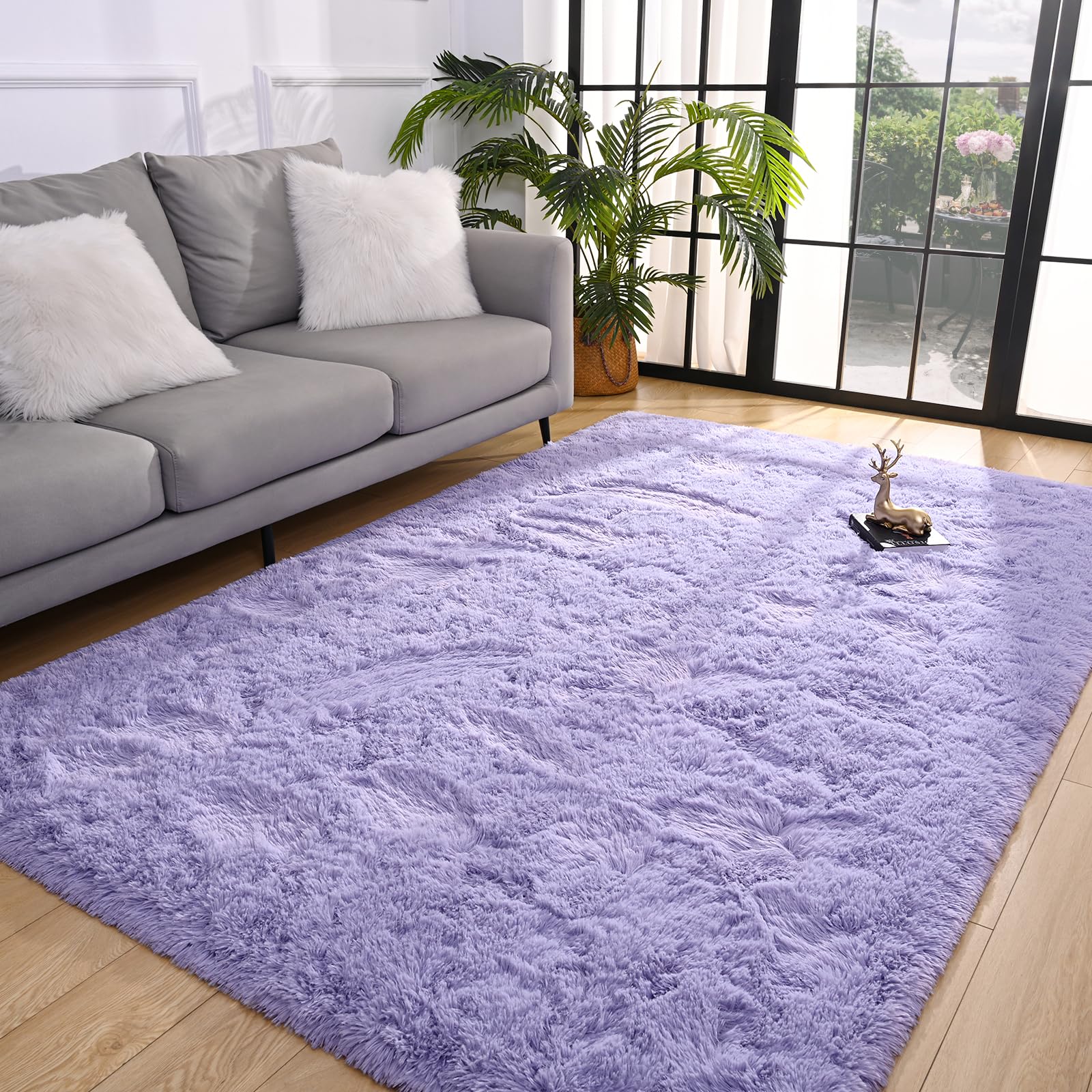Pettop rug next to chairs showing 4x6 size and scale for room planning