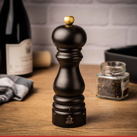 Peugeot Paris open top with exposed chamber and knob for easy refilling and adjustable grind