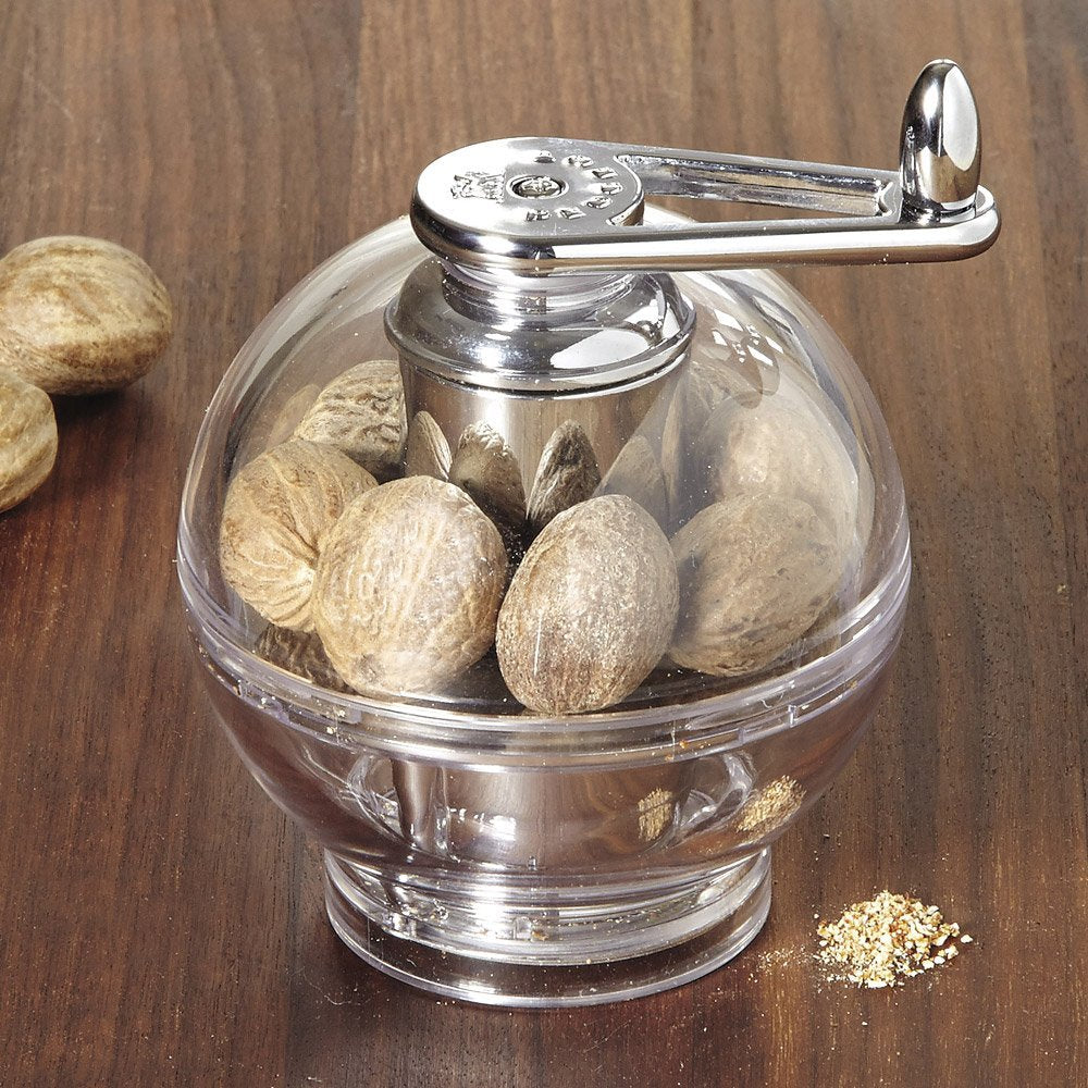 Peugeot Tidore shaving nutmeg over a dessert, fresh aroma and fine sprinkle benefit