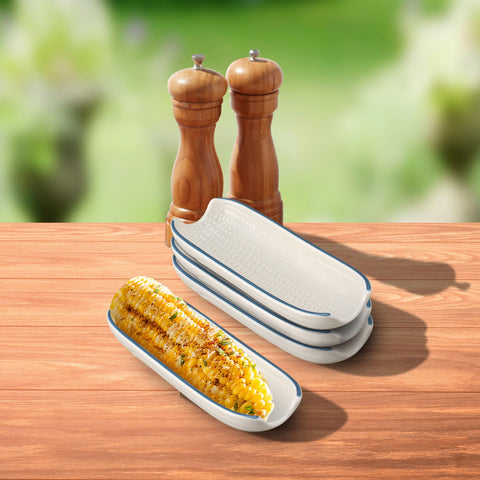 Pfaltzgraff corn dish in use holding a buttered cob demonstrating mess containment