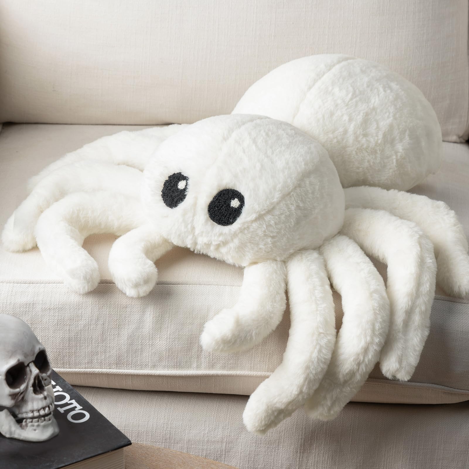 Phantoscope white spider pillow front view showing playful face and fluffy look