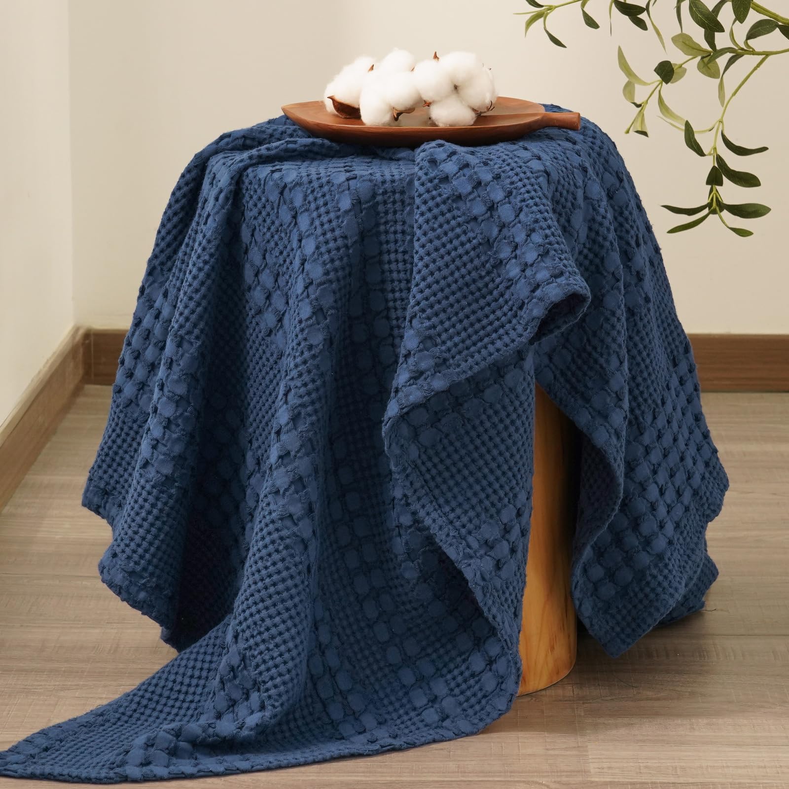 PHF layered at bed foot illustrating added warmth and style benefit