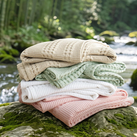 PHF blanket in washing machine illustrating machine-washable care benefit