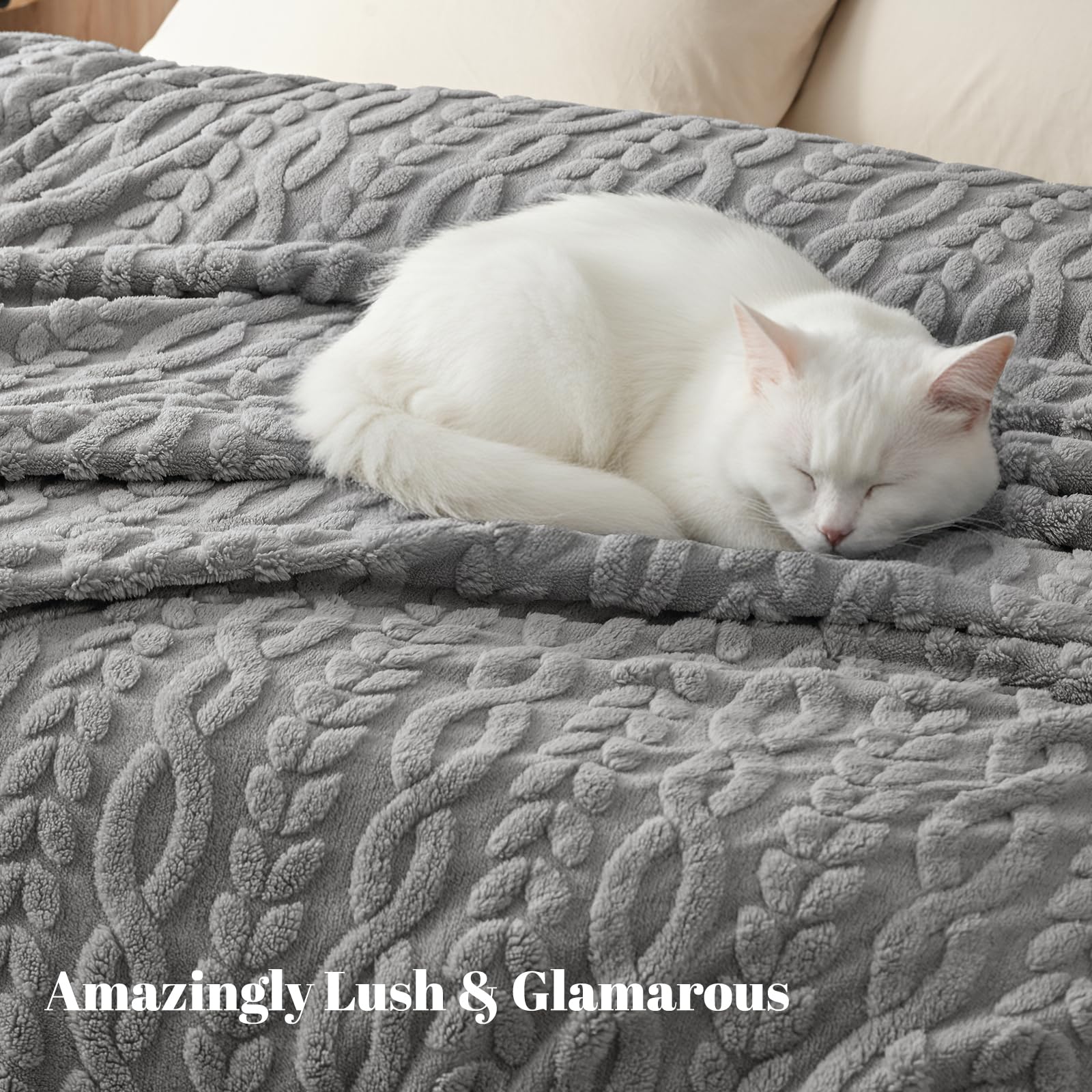 PHF blanket folded on queen bed adding softness and refined décor