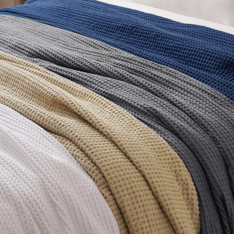 PHF blanket folded stack conveying easy storage and travel-ready convenience benefit