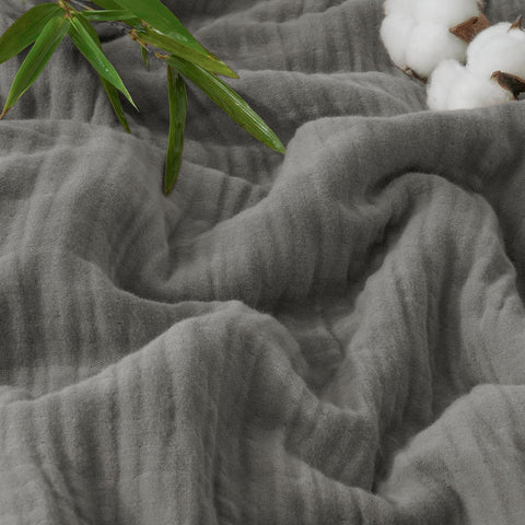PHF blanket front flat lay in grey showing full king size and airy look