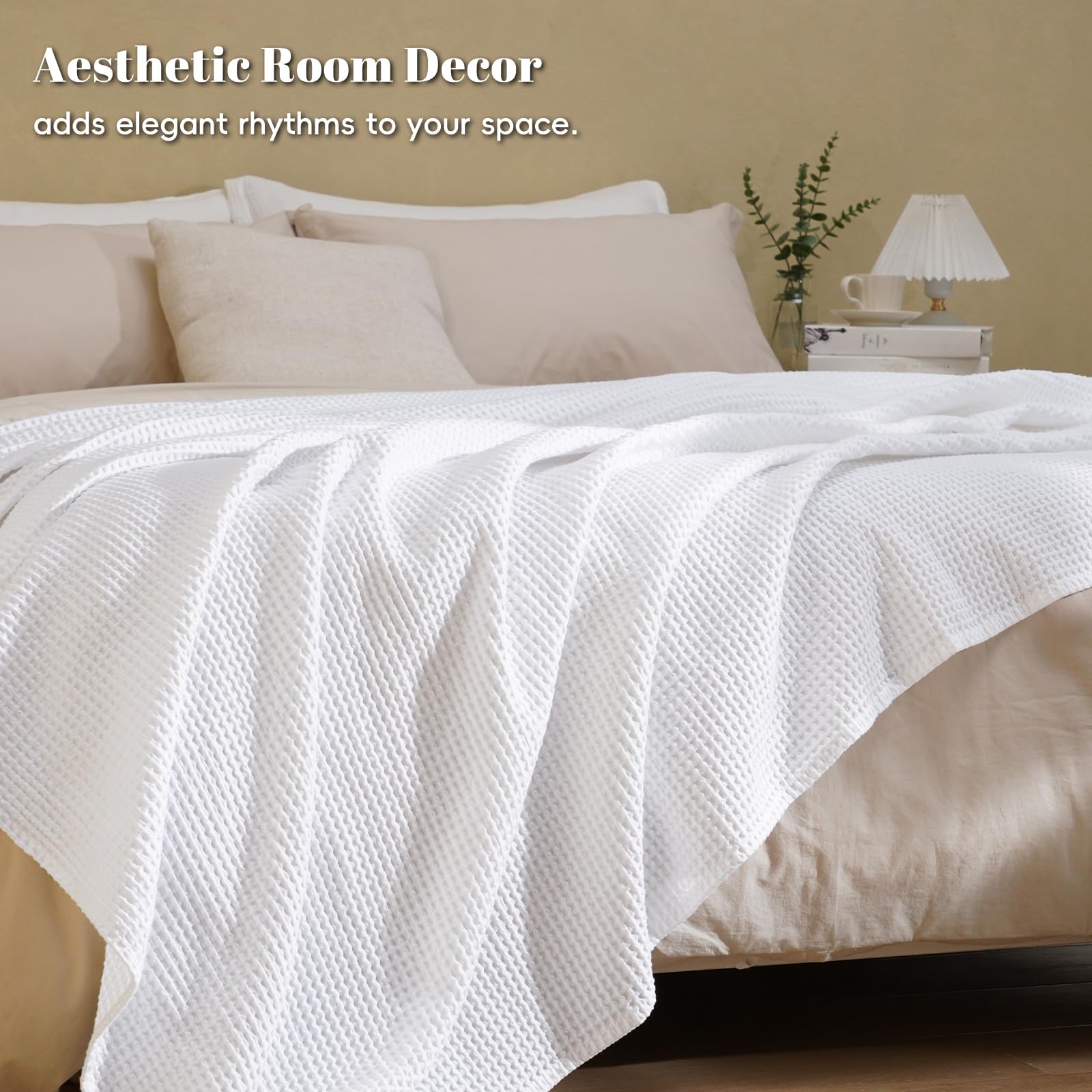 PHF blanket styled in bedroom showing PHF enhancing cozy modern decor