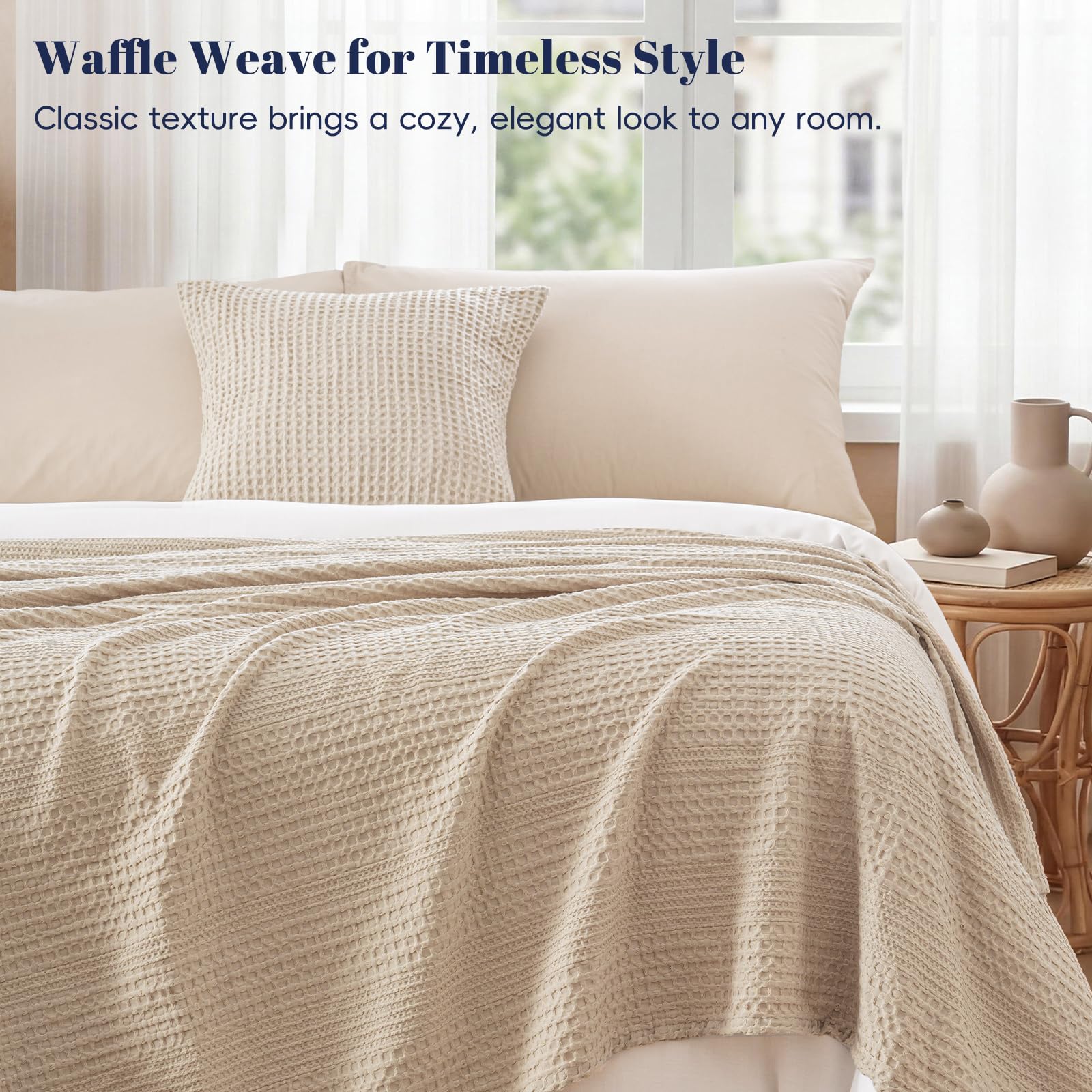 PHF blanket styled on queen bed in light tan offering breathable warmth and decor appeal