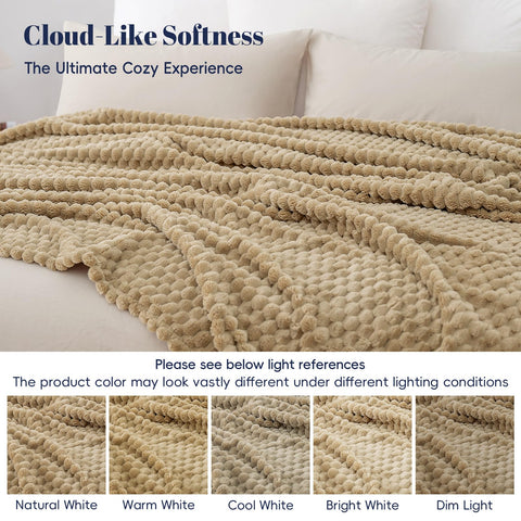 PHF blanket laid on queen bed styled for layering with added bedroom warmth